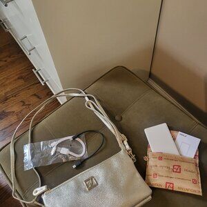 Hand bag with phone charger